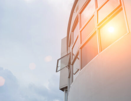 overheating training - building with sun reflection