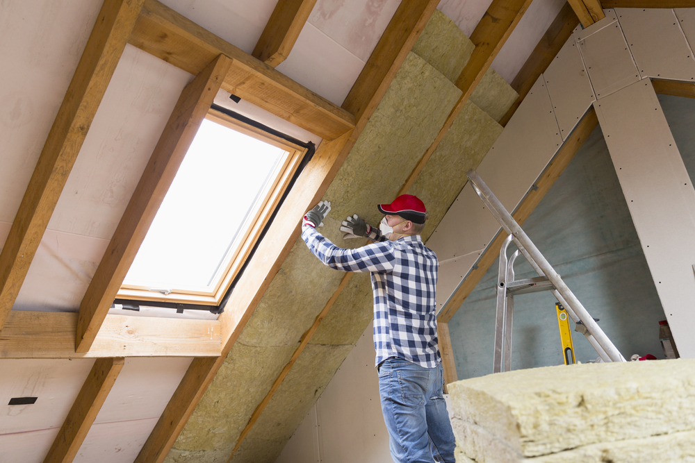 loft insulation being installed